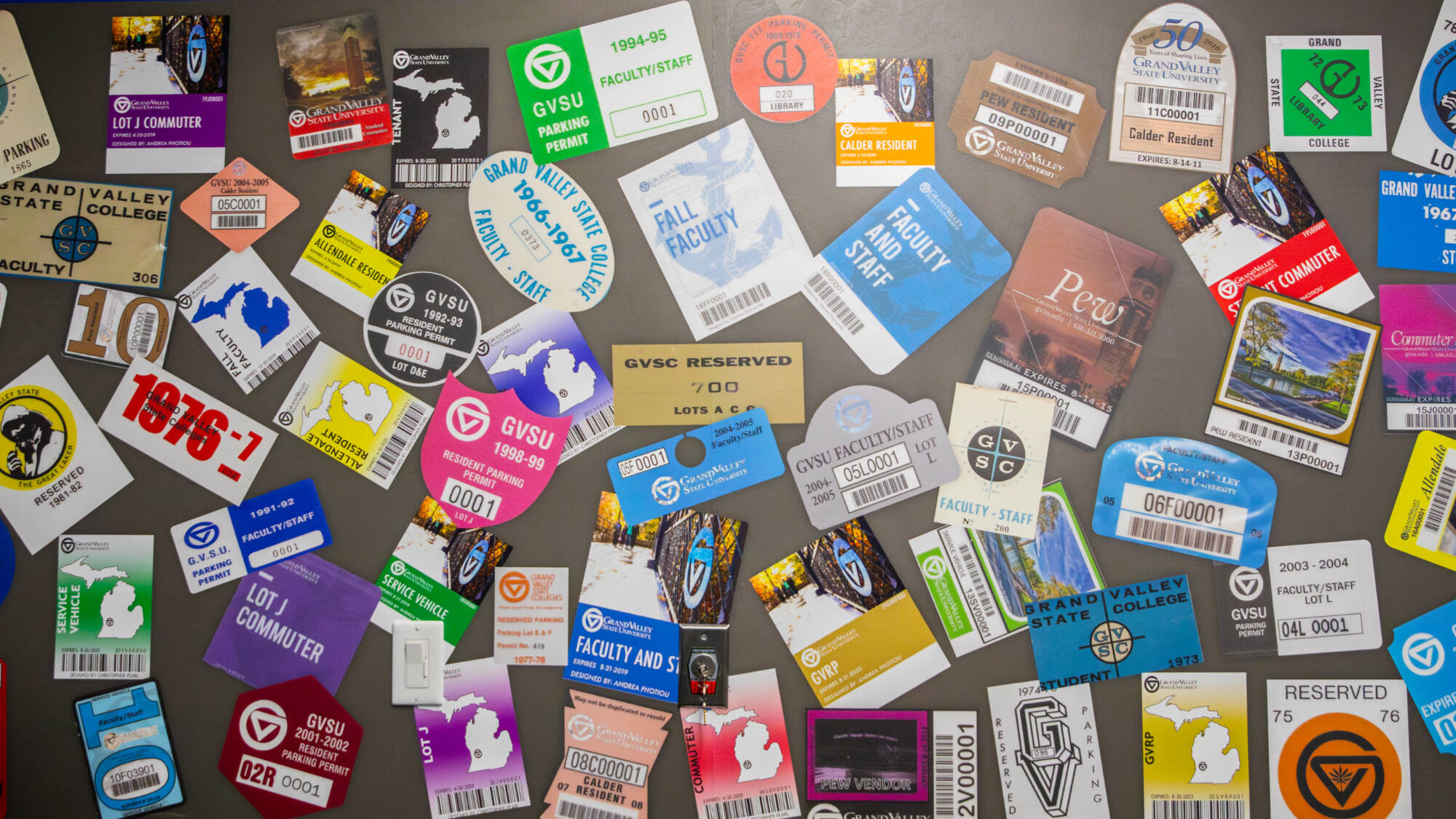 wall with all past gvsu parking permit designs